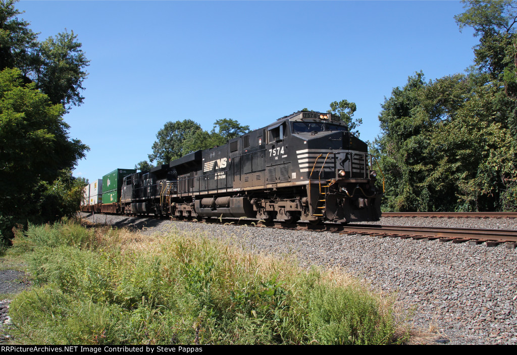 NS 7574 leads train 260 down the siding